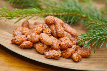 Roasted almonds in christmassy dekoration