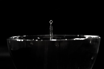 A simple drop of water in black and white created in a bowl