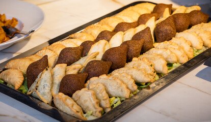 Delicious and divers Arab meal on a big table