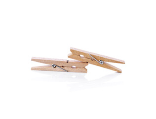 Wood clothespins isolated on white background