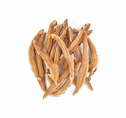 Dried Lingzhi mushroom sliced on white background.