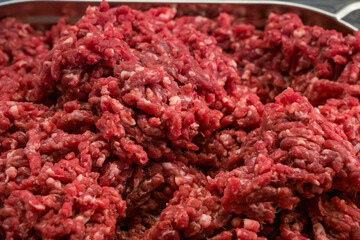 Fresh burger beef with greens and spices 