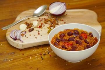 Chili con carne in a white bowl