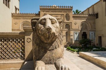 Lion statue in front of Coptic Museum in Cairo, Egypt with the largest collection of Egyptian Christian artifacts in the world. Founded by Marcus Simaika in 1908.