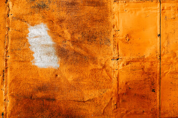 Aged metallic orange texture. Grunge-metal background