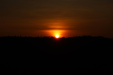 Sunset over the mountains in the evening