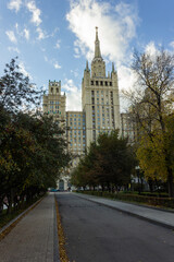 Fototapeta na wymiar Russia, Moscow - 15.10.2020: One of the seven Stalinist skyscrapers. Residential building on Kudrinskaya Square (Vosstaniya Square).