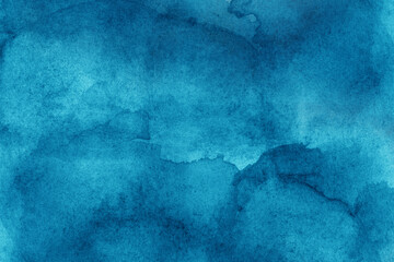 Hand painted blue watercolor background.
