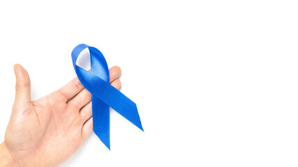 Cancer awareness blue. Blue ribbon in hands isolated on white background. Awareness prostate cancer...