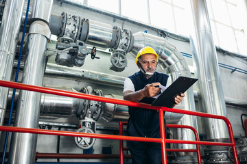 industrial worker in heating plant