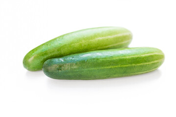 Green cucumber on white background, fresh vegetable, healthy diet food, salad ingredient
