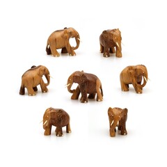 Wooden souvenir elephant made of wood and ivory isolated on a white background
