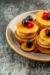 Vertical view of fruit pancakes breakfast stock image