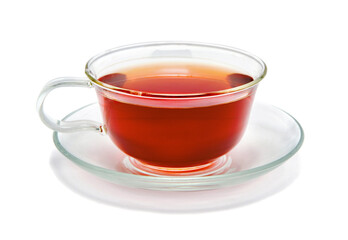 Glass cup of hot aromatic tea on white background