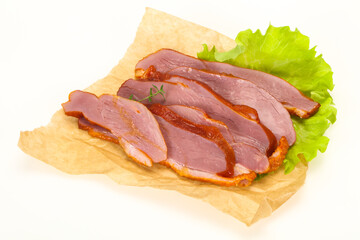 Sliced smoked duck breast served salad