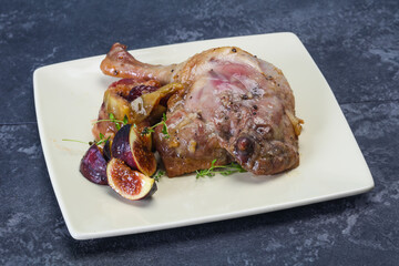 Roasted. duck. leg with plum and apple