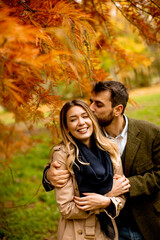 Young couple in the autumn park