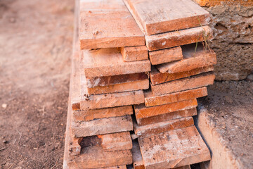 Planks stacked neatly in a stack