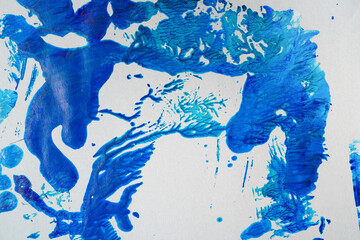 Blue acrylic paint on paper. Background made of stains of paint painted by hand