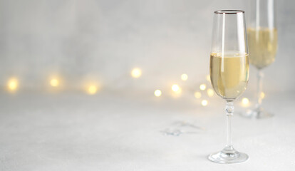 Color of the year 2021: grey and yellow. Two glasses of champagne. 