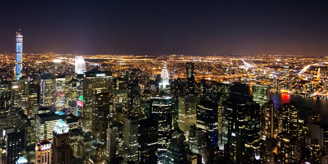 New York City Skyline at Night. Panoramic View of Manhattan, New York. Beautiful, Illuminated, Futuristic Buildings. 