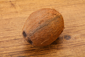 Tropical brown coconut over background