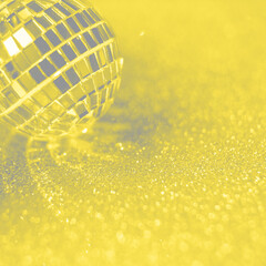 Close-up Crystal ball Decorated on Christmas night on a shiny background. Visualization trendy colors of year 2021 - Gray and Yellow.