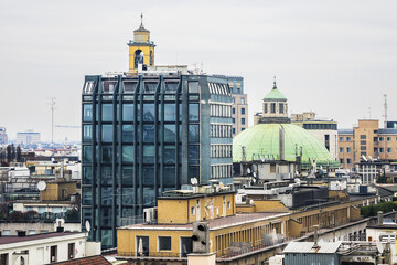 Fototapeta premium Aerial view of Milan cityscape from top of Milan Cathedral (Duomo di Milano). Lombardy, Italy.