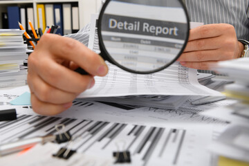 business concept - businessman working with reports in office, table and workspace close view,...