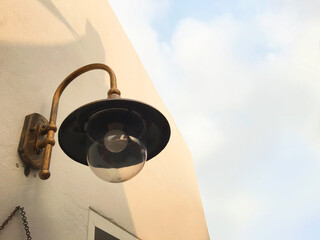 Vintage lamp with warm light for decoration exterior building.