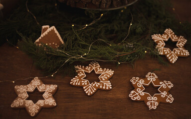 A variety of Christmas cookies and sweets. Top view on a wooden background. Holiday baking concept.
Christmas cookies. Decorative, decoration.Baked traditional Christmas tree, star cookies
