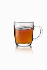 Tea in a transparent glass mug on a white background