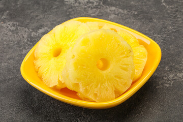 Sweet pineapple rings in the bowl