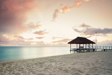 Panoramic footbridge over the indian ocean, Amazing flic en Flac beach at sunset,Mauritus island,Africa.