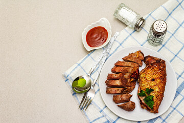 Fried duck breasts with sweet and sour berry sauce