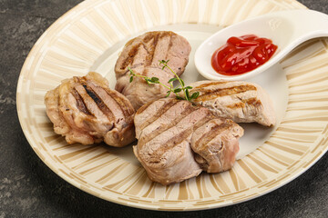 Grilled pork tenderlion with tomato sauce