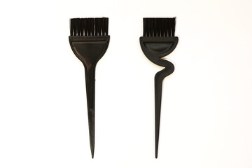 black brushes-hair coloring brushes used in salons, on a white background. 