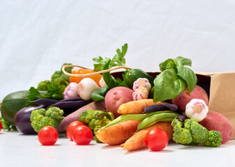 Frame of various isolated vegetables on white background.