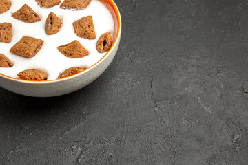 front view pillow cookies with milk for breakfast on a dark background sweet biscuit milk kid