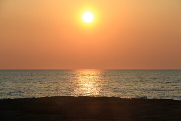 sunset time in livorno city beach