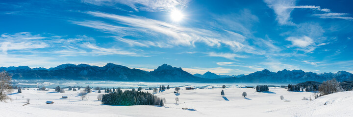 panoramic winter landscape in Germany, Bavaria, and alps mountain range