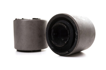 silent block on a white background, detail of the suspension from a truck and a car, photography...