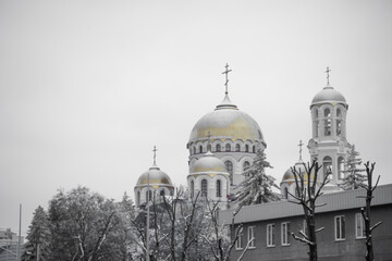 Fototapeta na wymiar Church with domes in the winter season