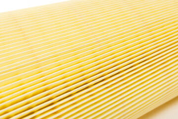 car air filter close-up, paper membrane for air purification, depth of field photography, texture of the filter element