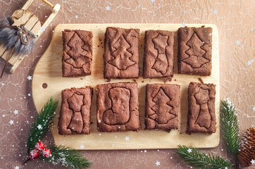 Chocolate Christmas biscuits with an imprint of a tree, a star and a shoe. homemade baking
