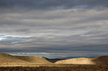 A late afternoon sunshine in an overcast Karoo