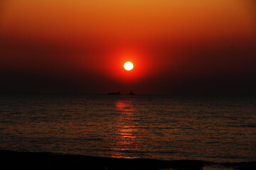 sunset at  livorno beach , Italy
