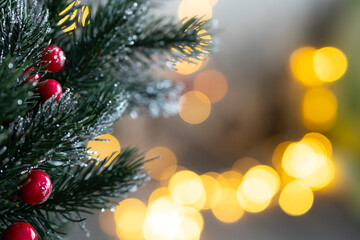 Christmas background. Christmas tree. Bokeh background. Blurred selective focus.