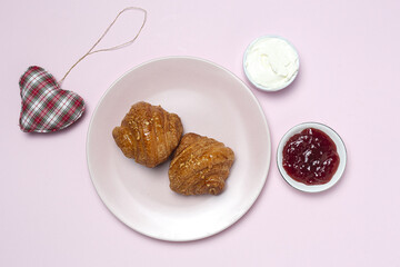 French Homemade fresh croissants with jam and butter