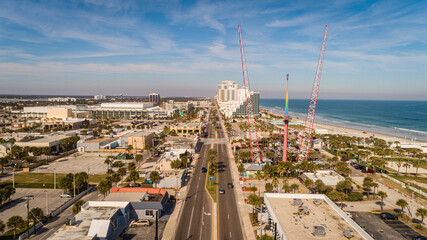 "Daytona Beach, FL USA - 12-10-2020: Symmetrical shot over A1A showing off the iconic Daytona Beach skyline and amusements."